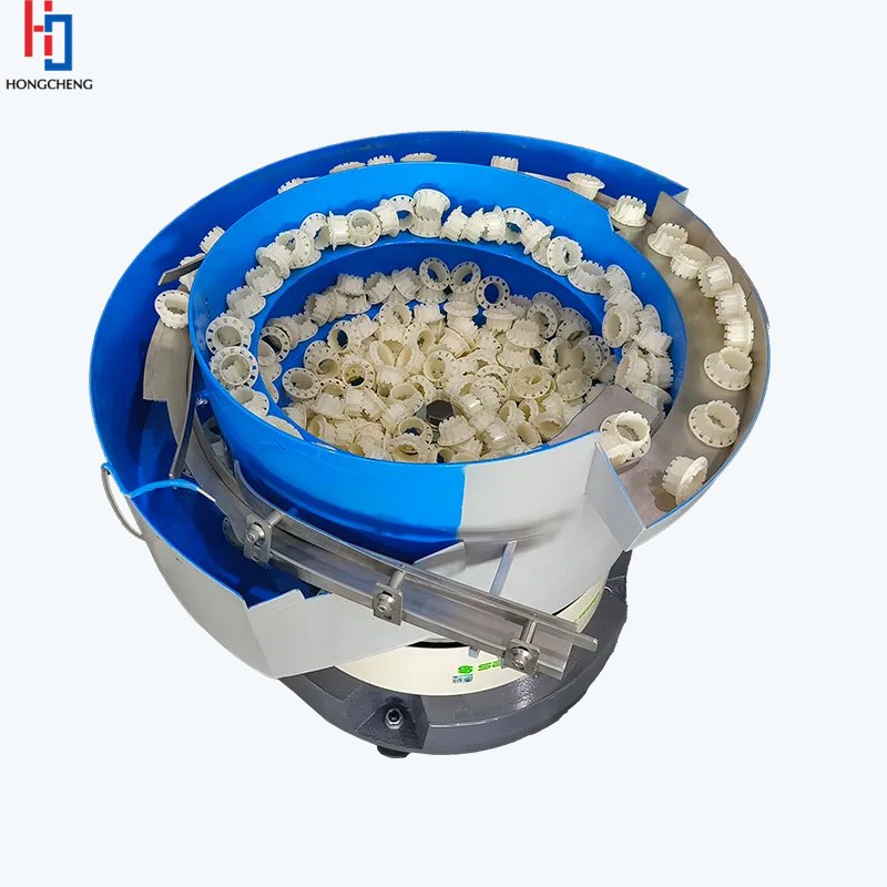 Small rubber plug feeding system for controlled component handling